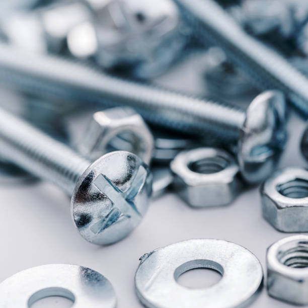 istock new bolts and nuts close-up 1345974073