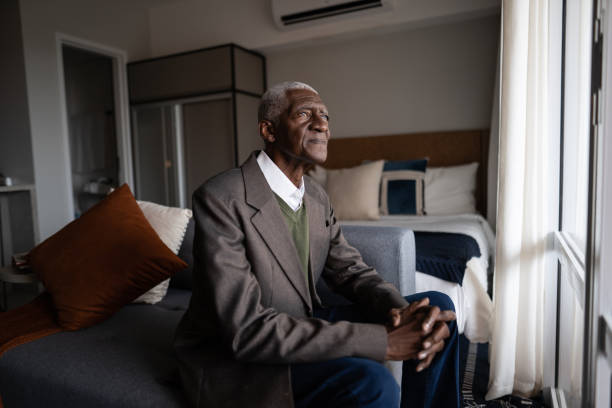 Contemplative senior man at home