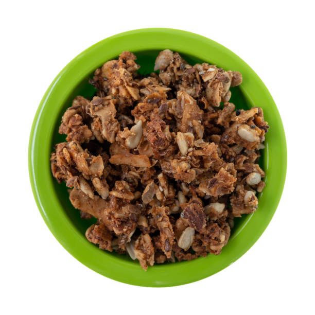 istock Bowl of cinnamon maple granola top view 1345981840