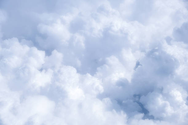 istock Blue sky with white clouds in sunny weather. Fluffy sky cloudy view atmosphere 1345987493