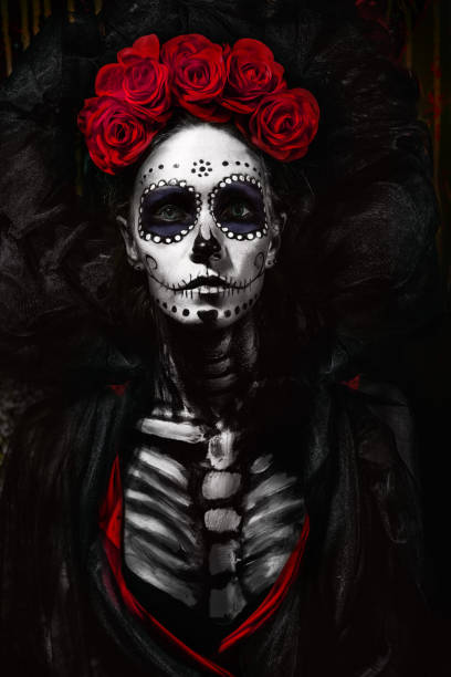 Santa Muerte Portrait of a dead girl with candles muerte stock pictures, royalty-free photos & images