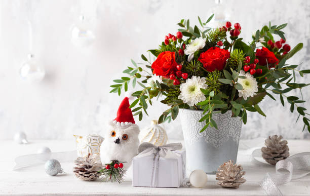 istock Christmas flower composition for holiday. 1345989119