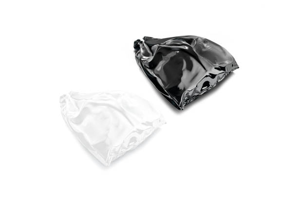 istock Blank black and white full t-shirt plastic bag mockup, isolated 1345990323