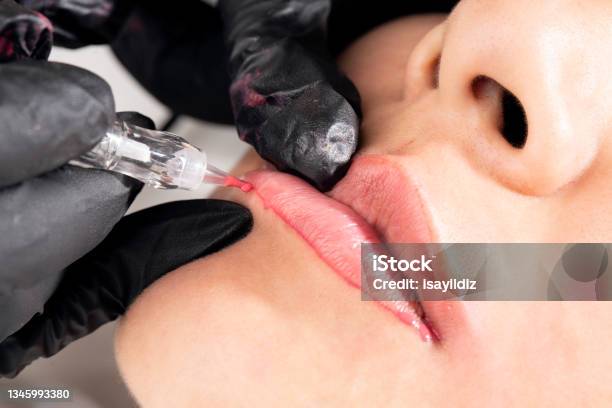 Beautician Is Applying Permanent Make Up Stock Photo - Download Image Now - Permanent Make-Up, Human Lips, Before and After