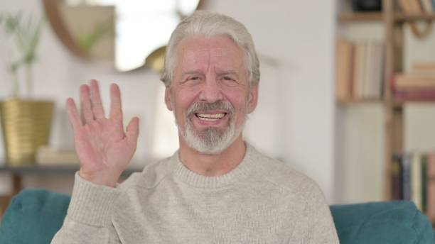 istock Online Video Call by Senior Old Man at Home 1345994778