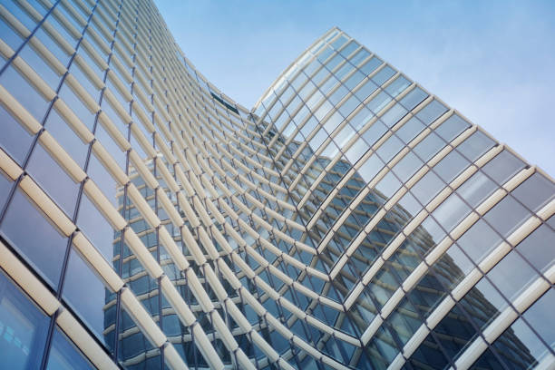istock Steel and glass business background 1345995499