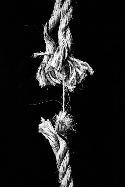 danger: frayed rope about to snap - rope frayed emotional stress breaking imagens e fotografias de stock