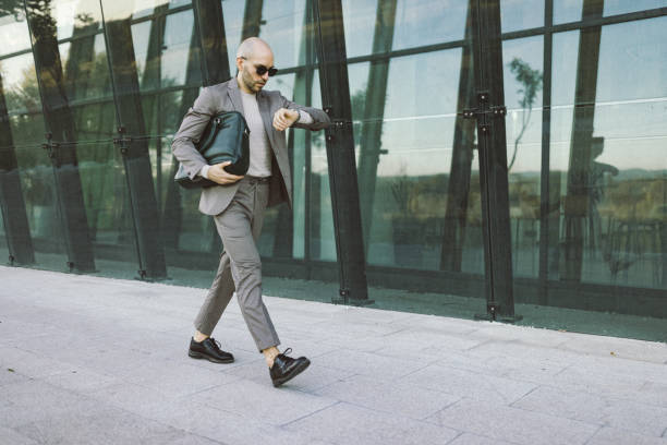 istock Businessman rushes to work 1345998955