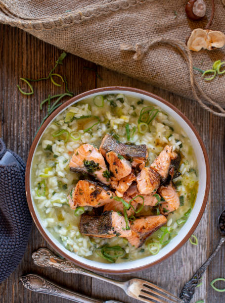 Fried salmon with risotto stock photo