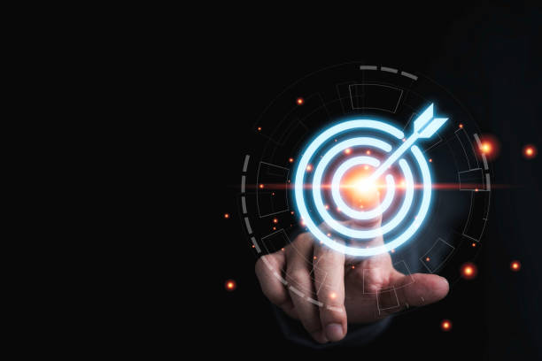 istock Businessman hand touching to target dart board for setup and achievement objectives target for business investment concept. 1346001816