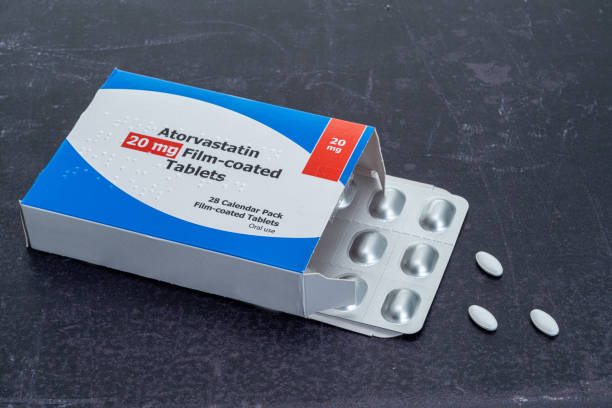 Generic box of statin pills A generic box of statin pills statin stock pictures, royalty-free photos & images