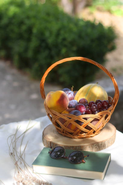 istock Fruit Basket, Book, Sunglasses and Lavender 1346002204