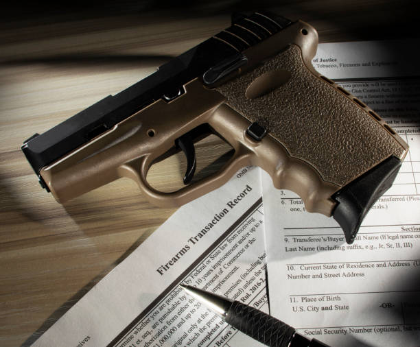 istock Public domain gun purchase form with semi-automatic pistol 1346002206