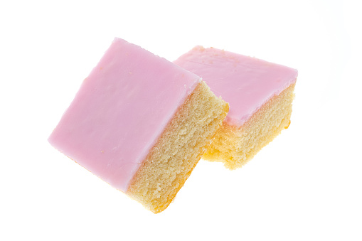 Slice of Tottenham cake - white background