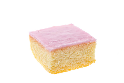 Slice of Tottenham cake - white background