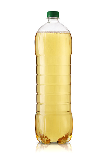plastic bottle with apple drink on white background