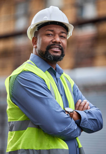istock Portrait of a proud contractor posing outdoors at a construction site 1346005935