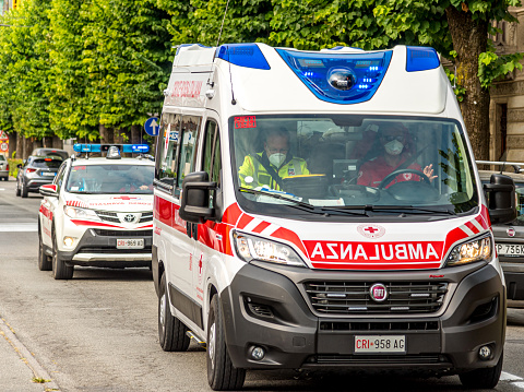 Savigliano, Cuneo, Italy - September 2, 2021: Ambulance of the Italian Red Cross with following car for advanced rescue in first aid
