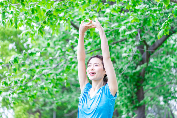 istock A young woman stretching in the nature 1346007801