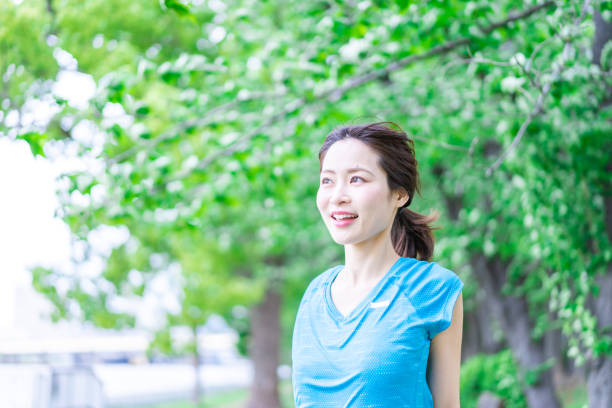 istock A young woman stretching in the nature 1346007811