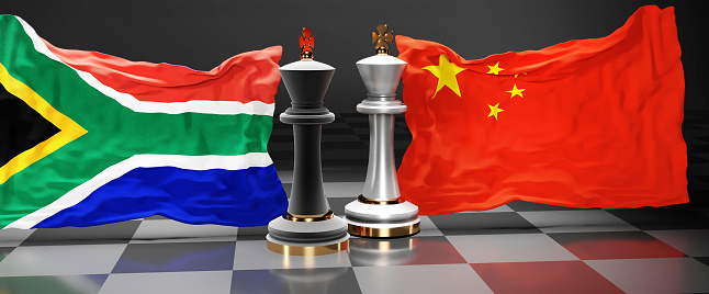 South Africa China summit, fight or a stand off between those two countries that aims at solving political issues, symbolized by a chess game with national flags, 3d illustration.