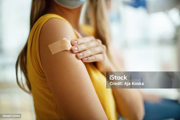 Covid19 Vaccination Stock Photo - Download Image Now - Vaccination, Adhesive Bandage, Women