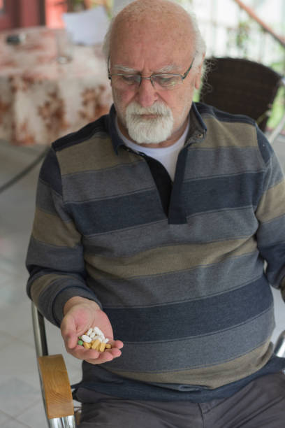 istock Senior Man Taking Daily Medication 1346015426