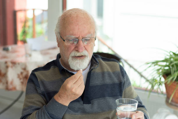 istock Senior Man Taking Daily Medication 1346015464
