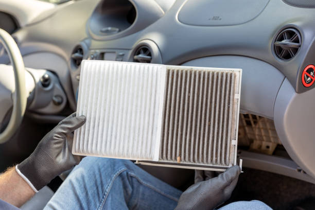 istock Dirty and clean cabin pollen air filter for a car 1346016573