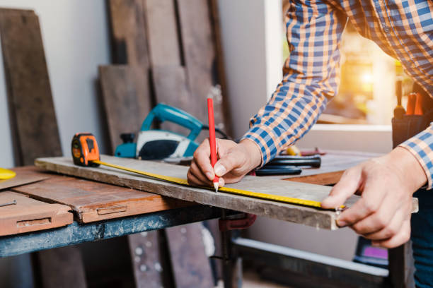 istock Carpenter working on woodworking machines in carpentry shop. 1346016685