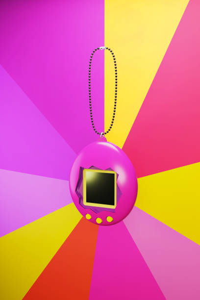 istock 3D illustration retro game tamagotchi  on colorful  background 3D rendering 1346016781