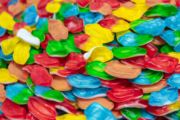 istock Jelly candies, lip-shaped sweets of different colors. 1346018964