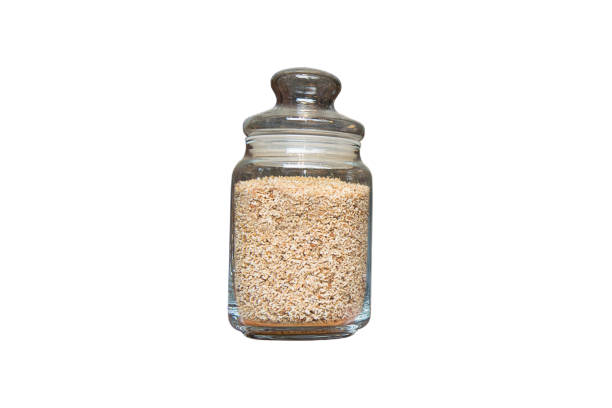 istock Herbal tea in glass jar. Isolated on white background. 1346019032