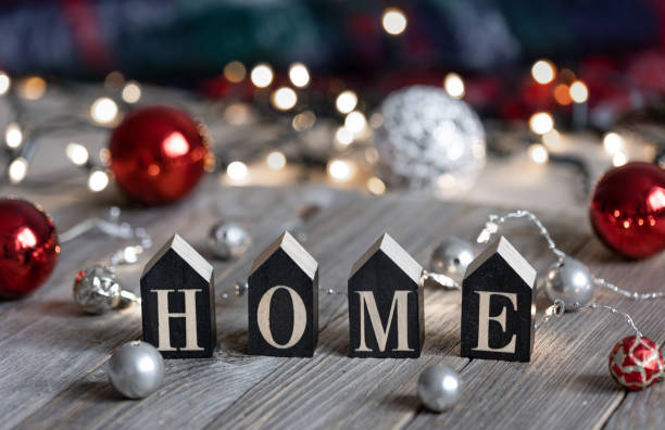 Christmas background with decorative word home and decor details.