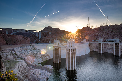 Hoover Dam is a concrete arch-gravity dam in the Black Canyon of the Colorado River, on the border between the U.S. states of Nevada and Arizona.