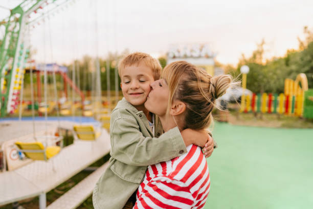 istock Hug with mommy at the traveling fair 1346019551