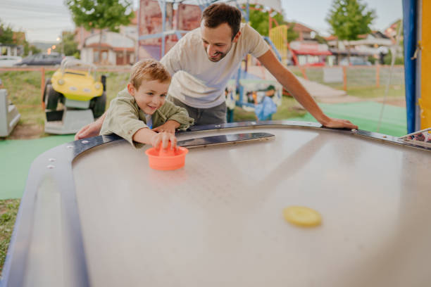 istock Playing air hockey with my dad 1346019556