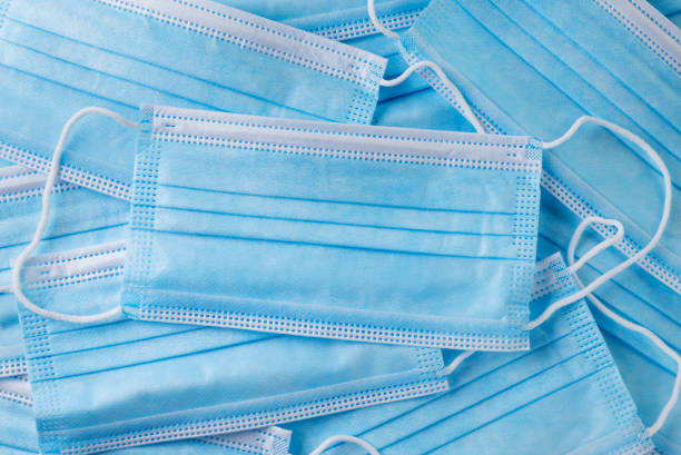istock Medical face masks background. The view from top 1346019778