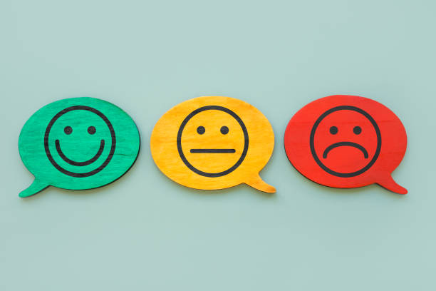 istock Customer satisfaction index concept. Smiley faces on the plates. 1346022279