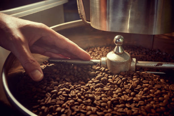 istock Close up of a worker's hand in coffee 1346022748