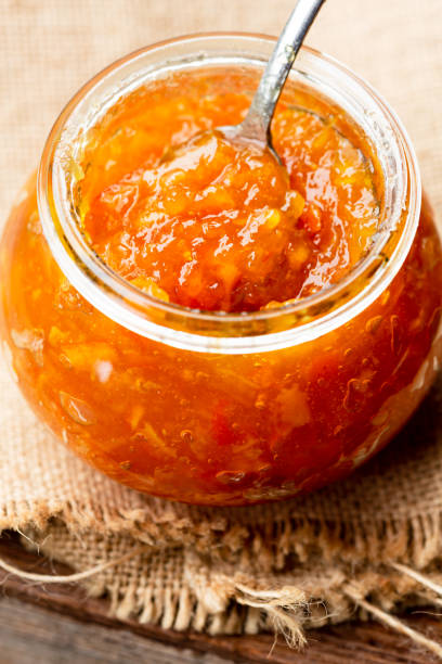 istock orange jam in a glass jar 1346023830