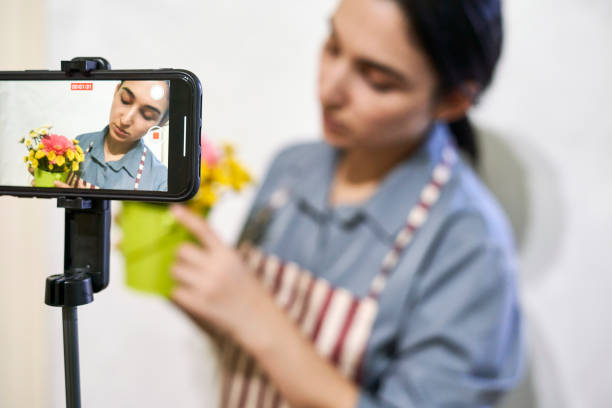 istock Multiracial florist blogger live streaming online 1346025425