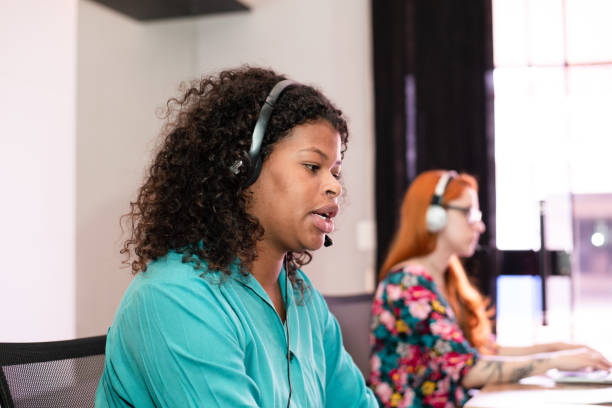 istock Two women working in customer service 1346026996