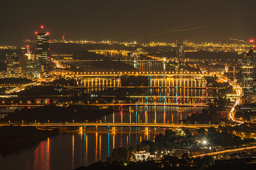 Vienna by Night Viewed From Above With Lights of the Skyline and Bridges Reflecting in Danube River Lots of Light Pollution