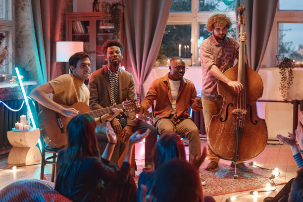 istock Musical band playing in the club 1346027720