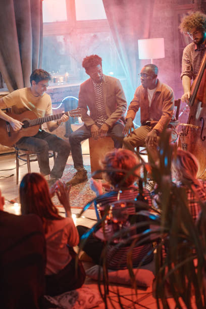 istock Young musicians performing for their friends 1346027743