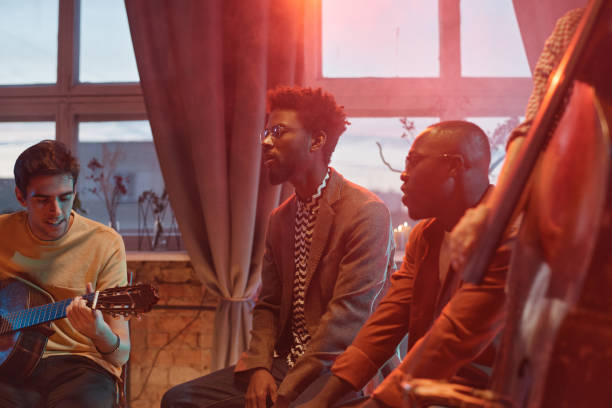 istock People playing the music together 1346027763