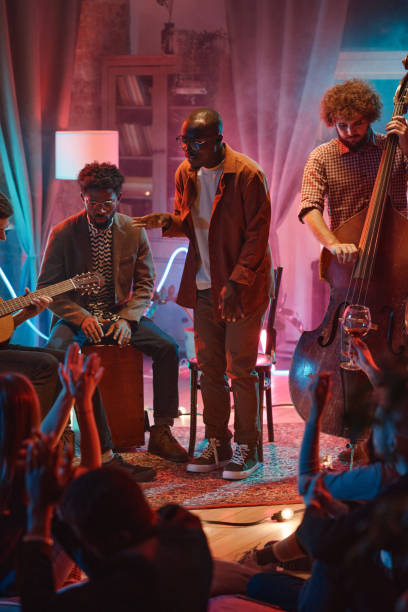 istock Man singing together with his band 1346027890