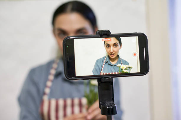 istock Multiracial florist blogger live streaming online 1346028176