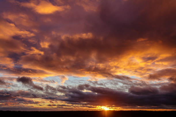 Beautiful pastel cloudy sunset with blue sky in California.